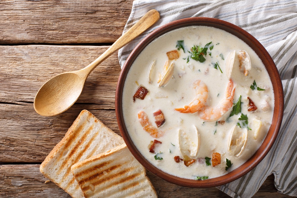 American cuisine: New England clam chowder soup closeup. horizon